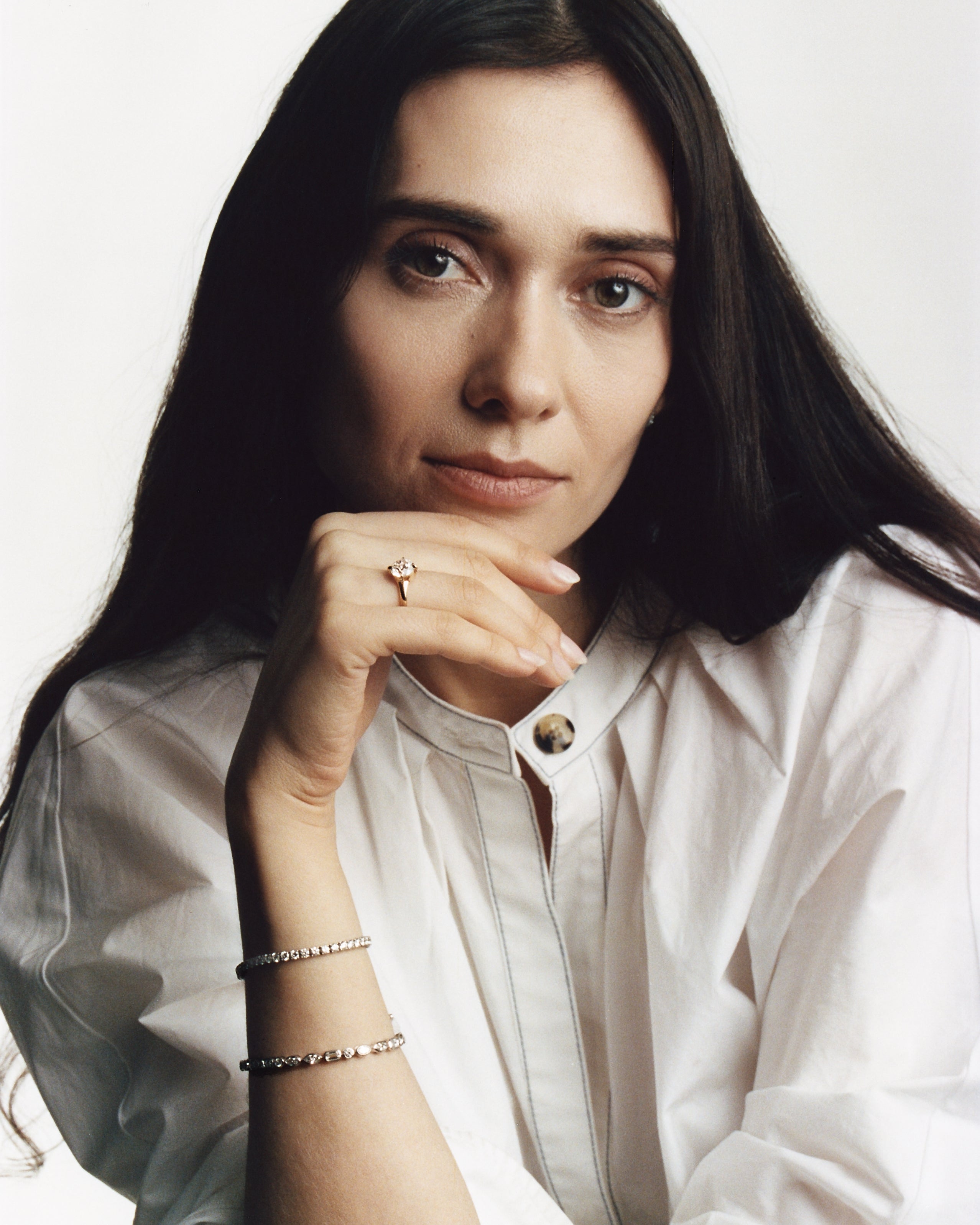 model posing with 4 prong tennis bracelets with diamonds 
