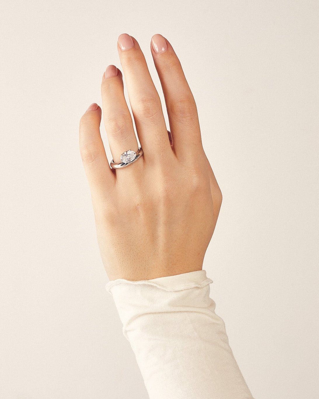 white gold engagement ring with oval diamond