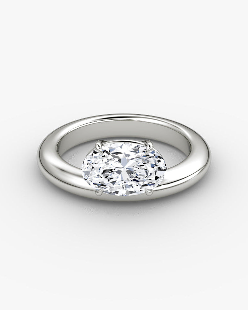 white gold engagement ring with oval diamond