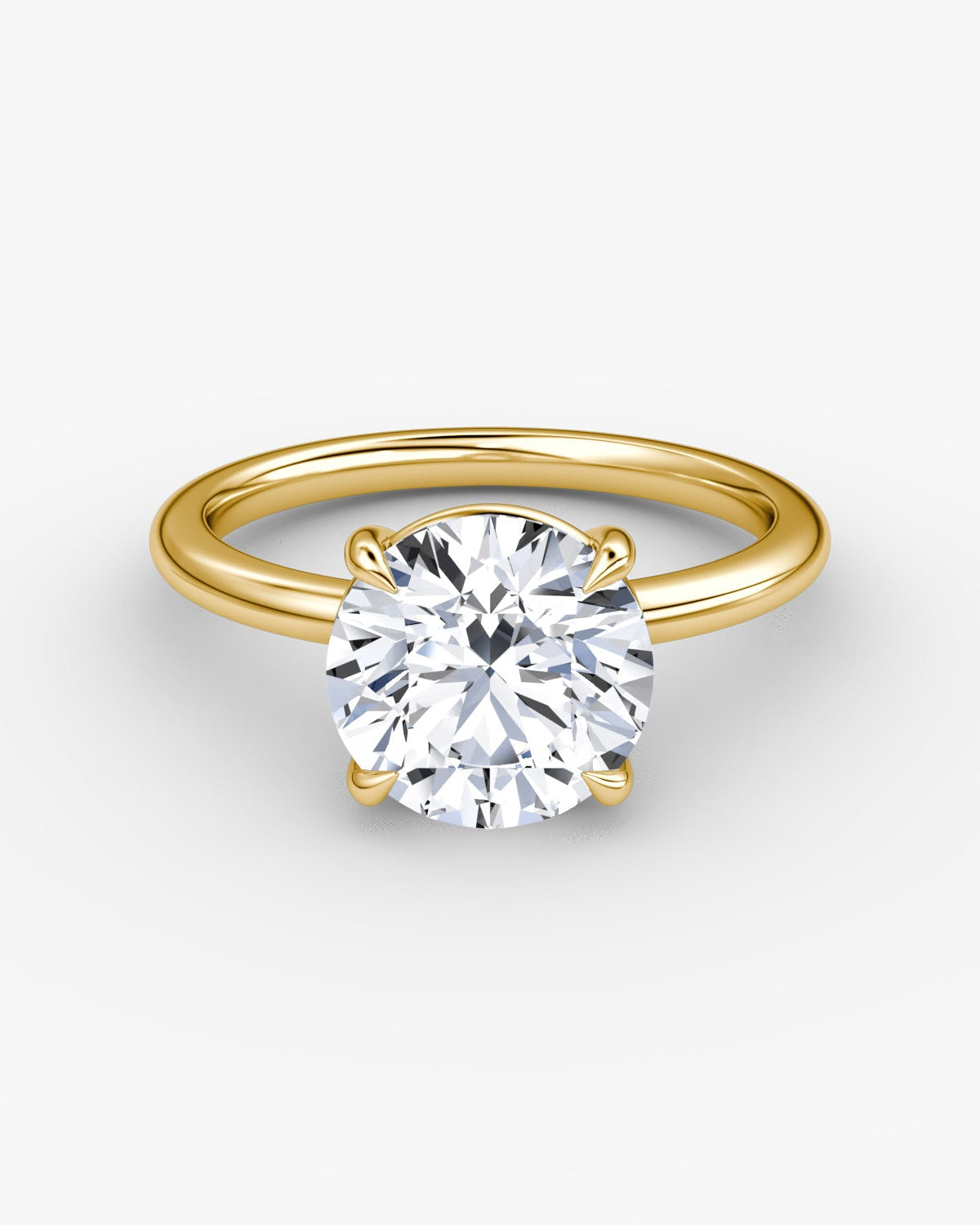 yellow gold engagement ring with round brilliant diamond