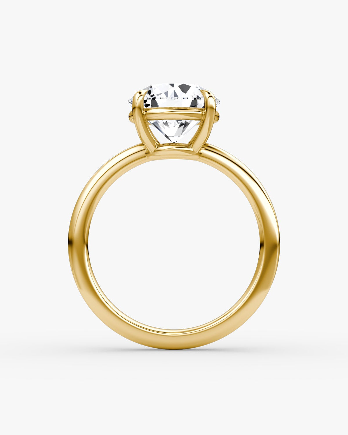 yellow gold engagement ring with round brilliant diamond