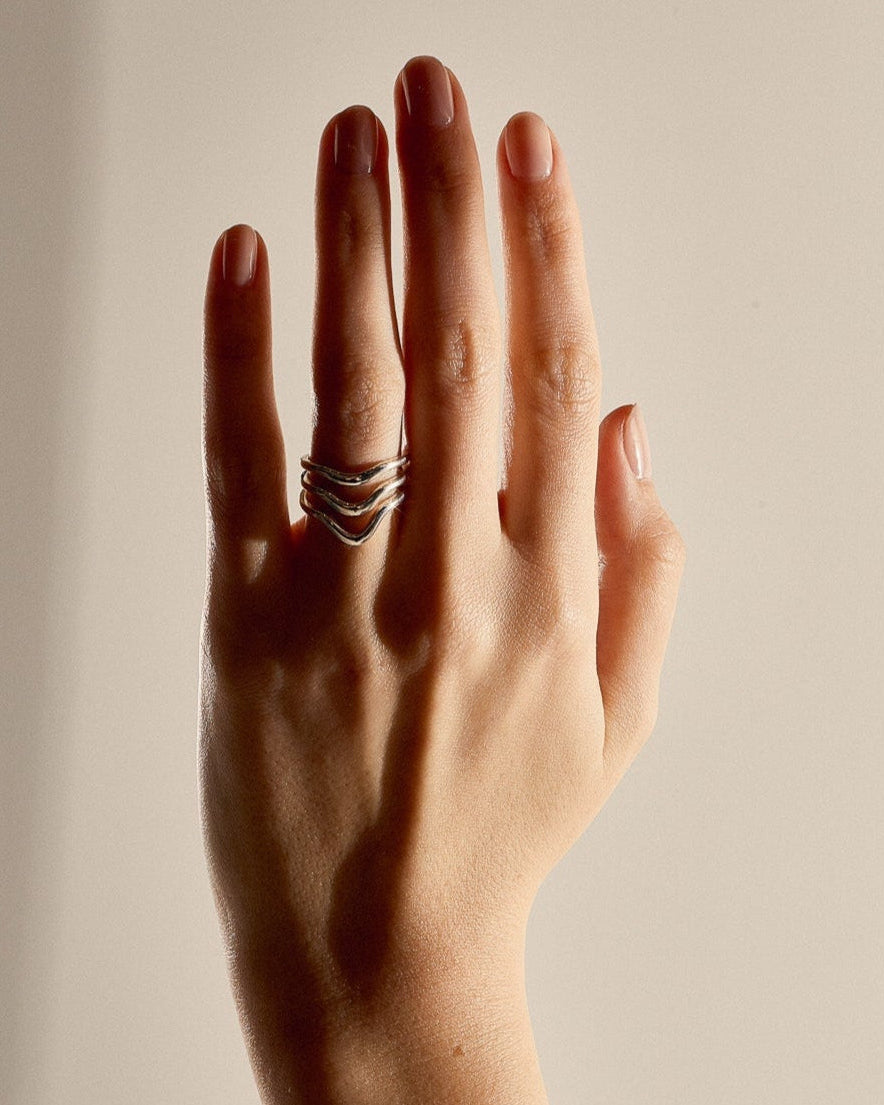 gold curved wedding bands