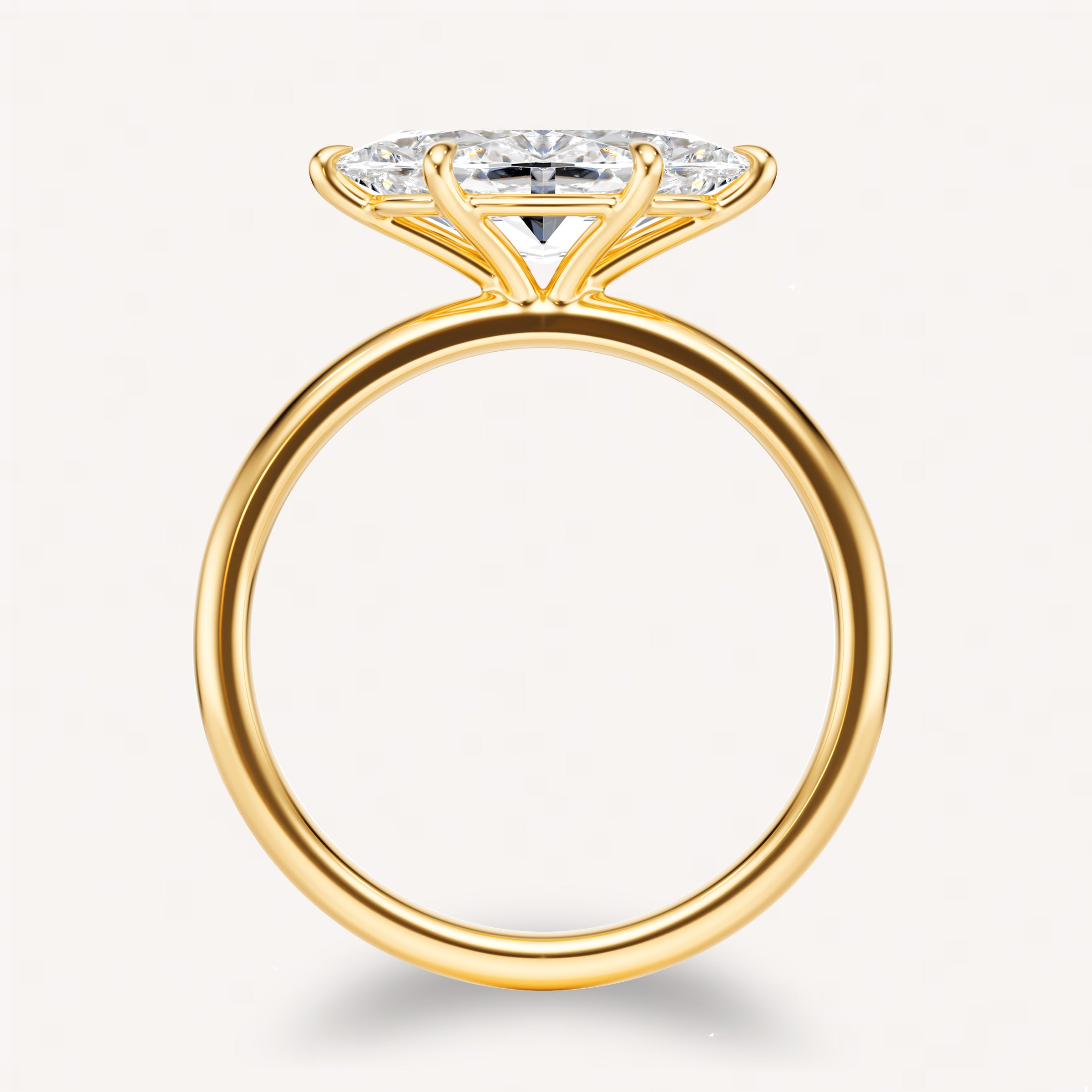 side view of gold engagement ring with marquise diamond 