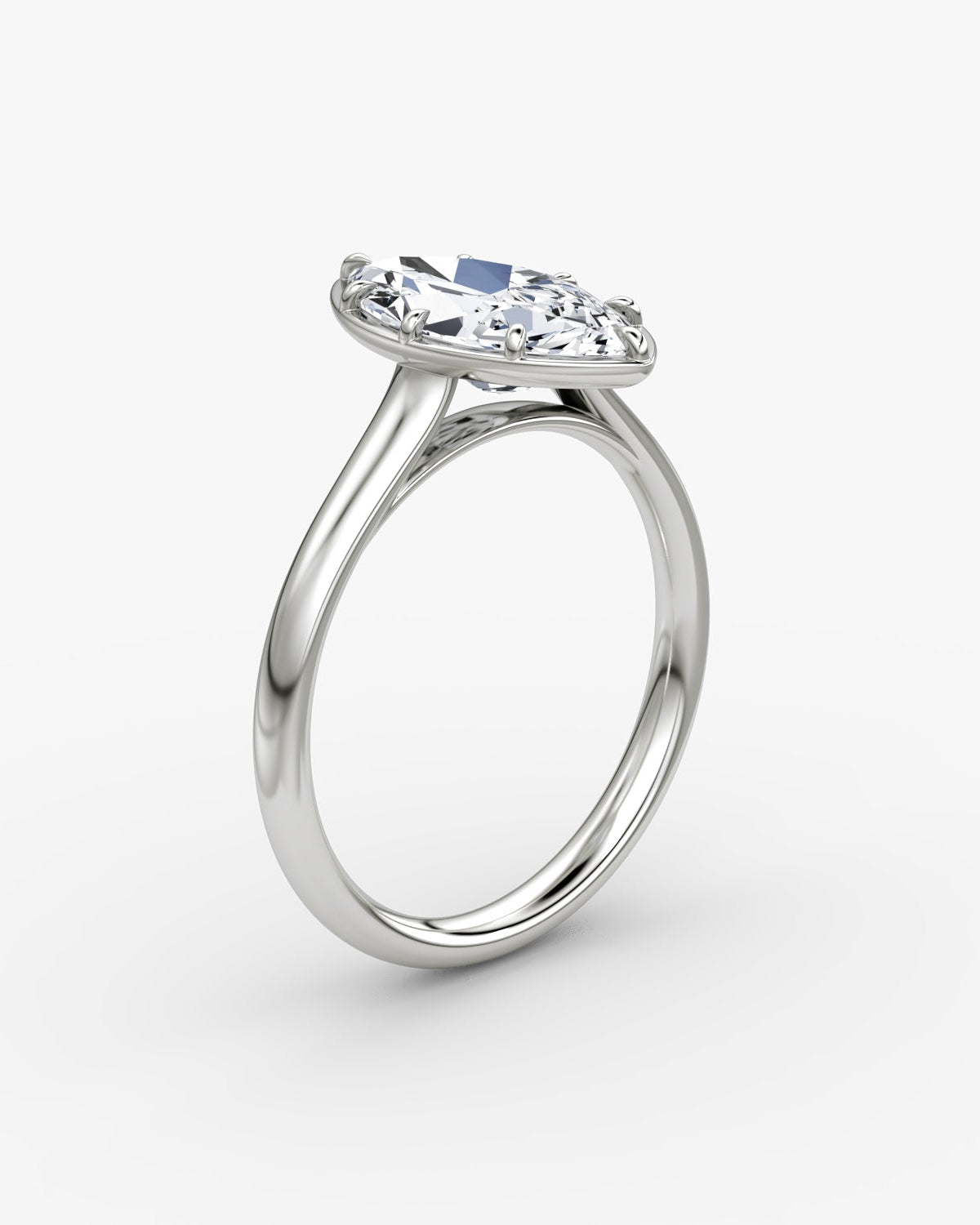 White Gold engagement ring with a marquise diamond on a white background