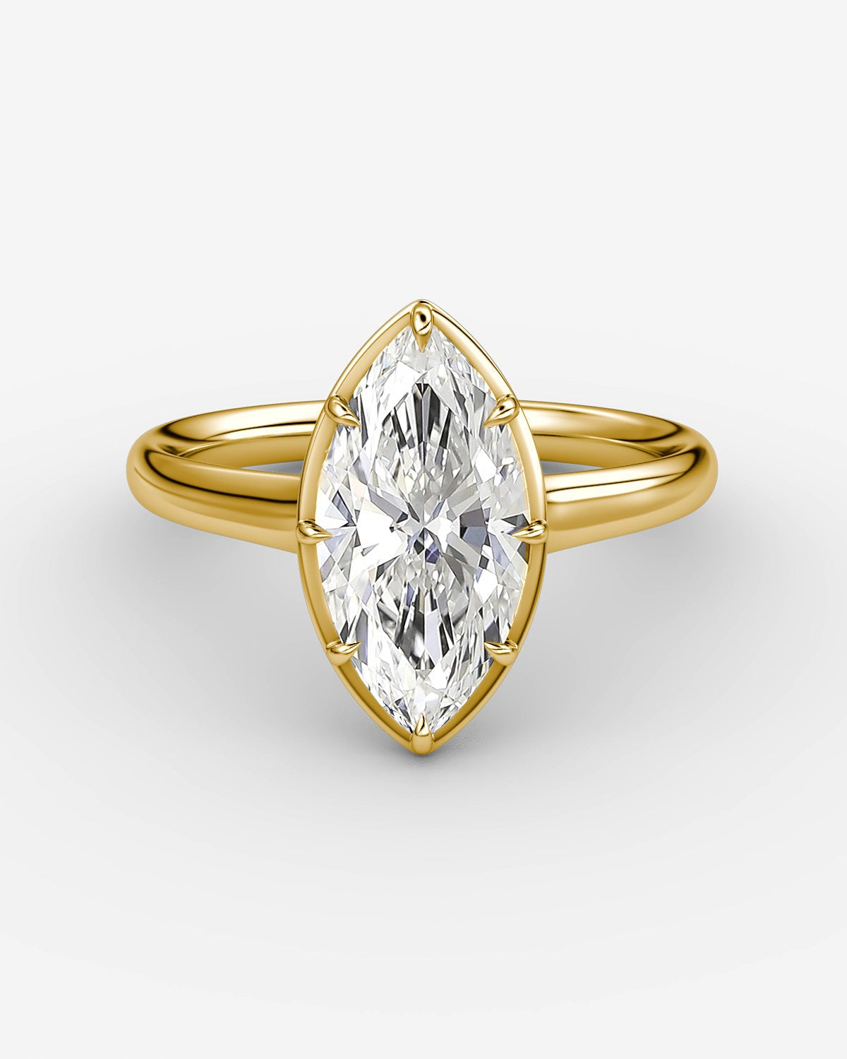 yellow engagement gold ring with a marquise shaped diamond