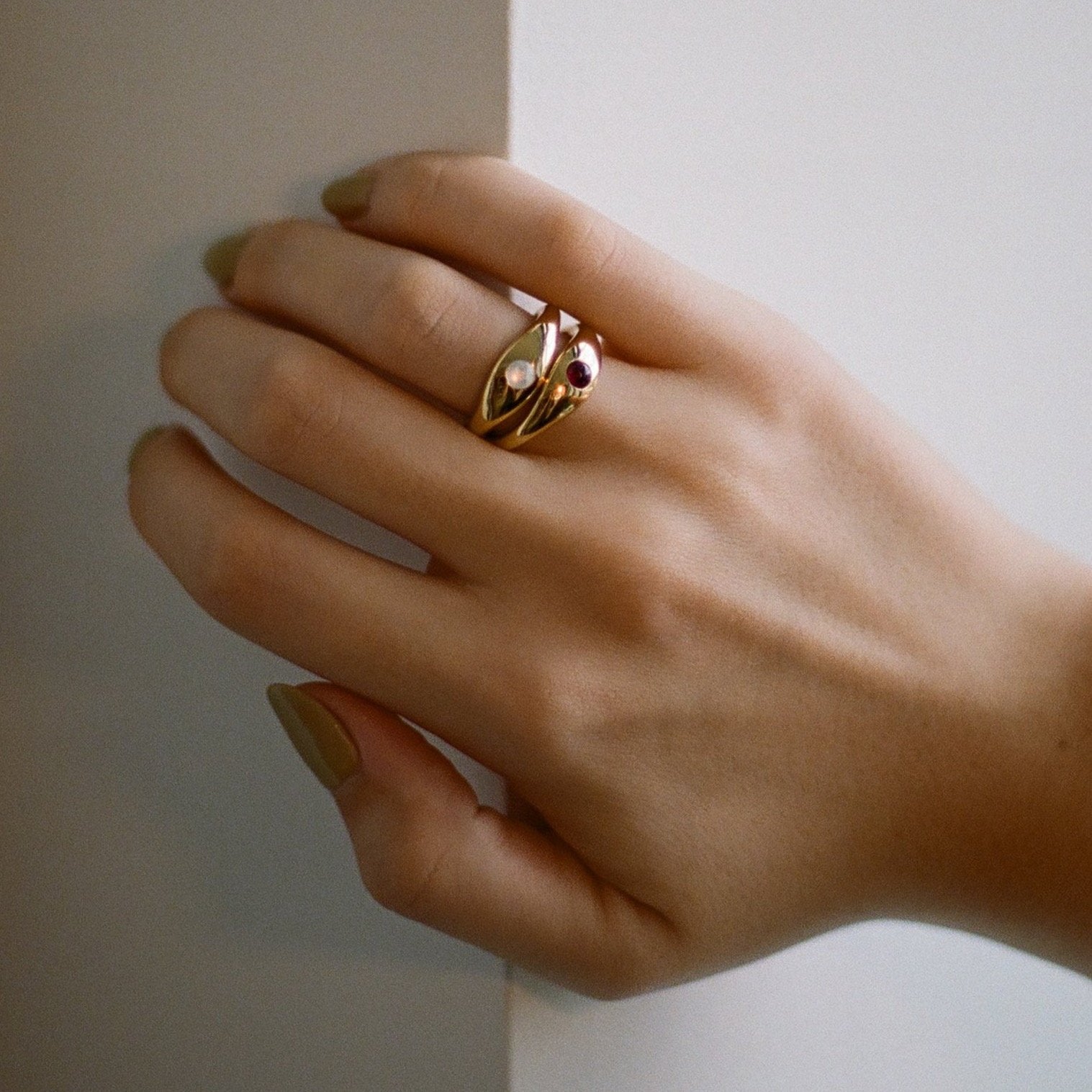 gold ring stack with pearl and ruby 